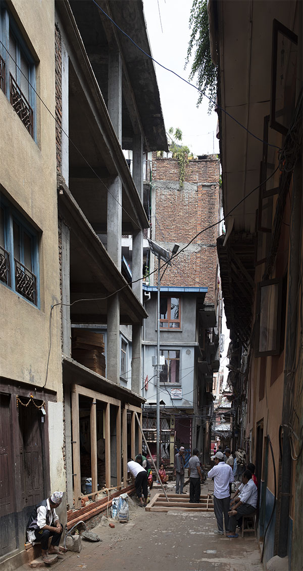 Photo, assembling doorframes for a new building, Old Patan, Nepal.